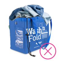 Wash n Fold bag overfilled with clothing crossed out